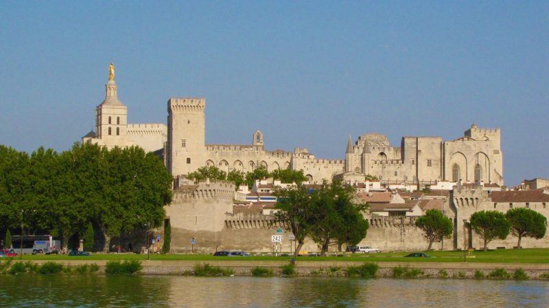 The Palais des Papes in Avignon, France, seen from across the Rhône River.